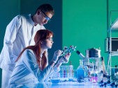 scientists studying a molecular structure