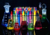 Wax crayons and measuring flasks